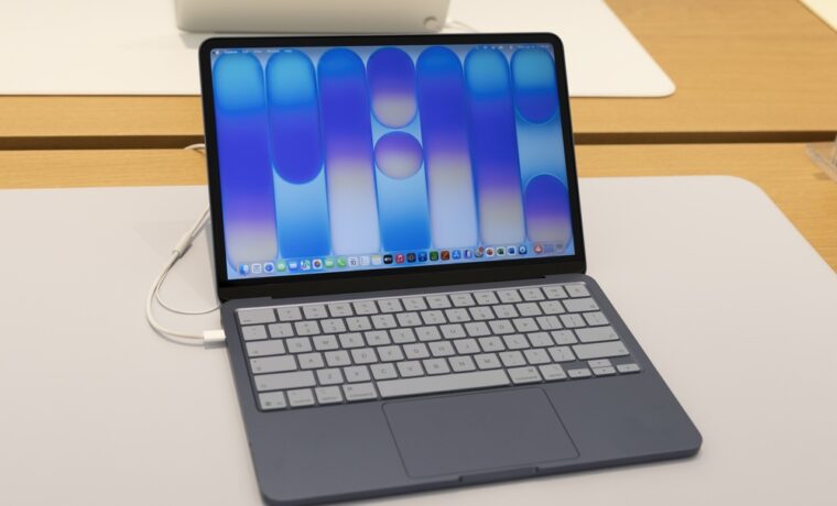 Immagine di un MacBook e iPad
