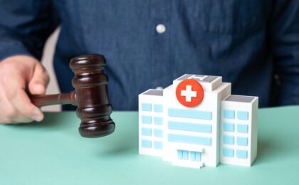 Un paziente in un letto d'ospedale